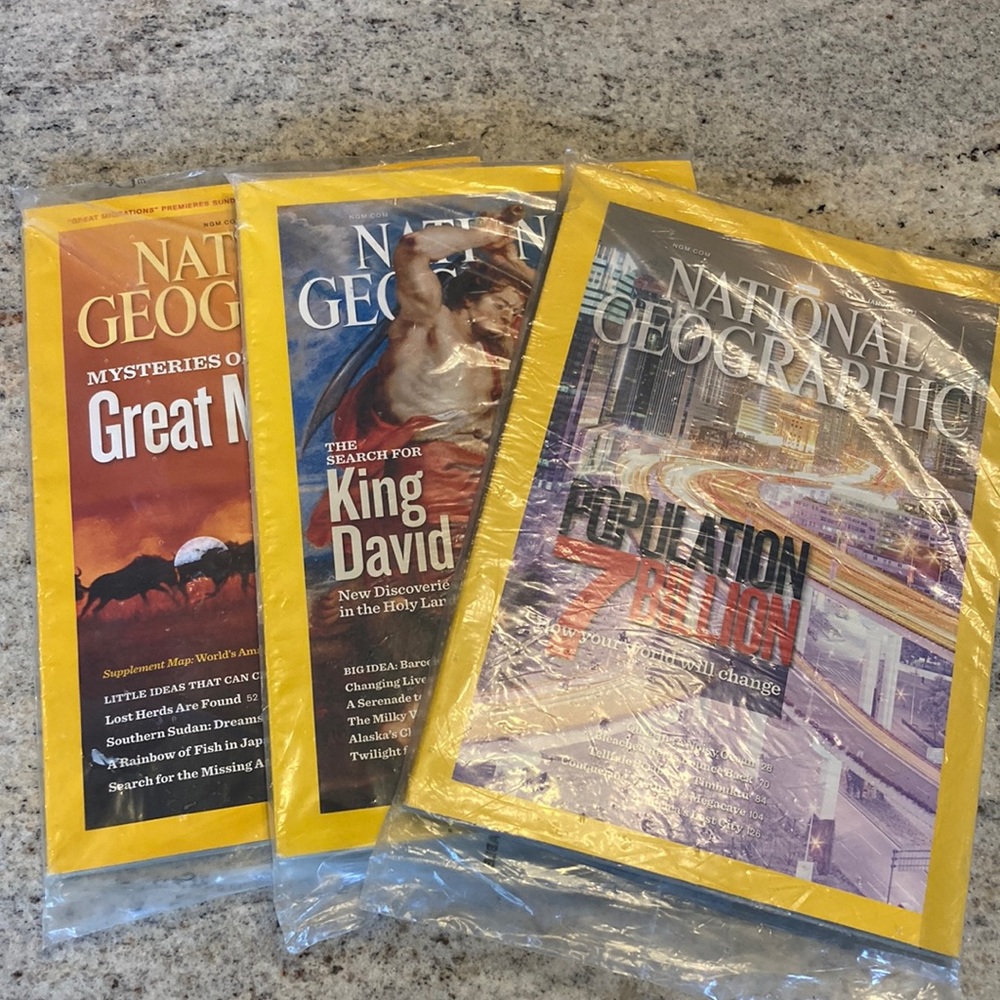 3 unopened National Geographic Books